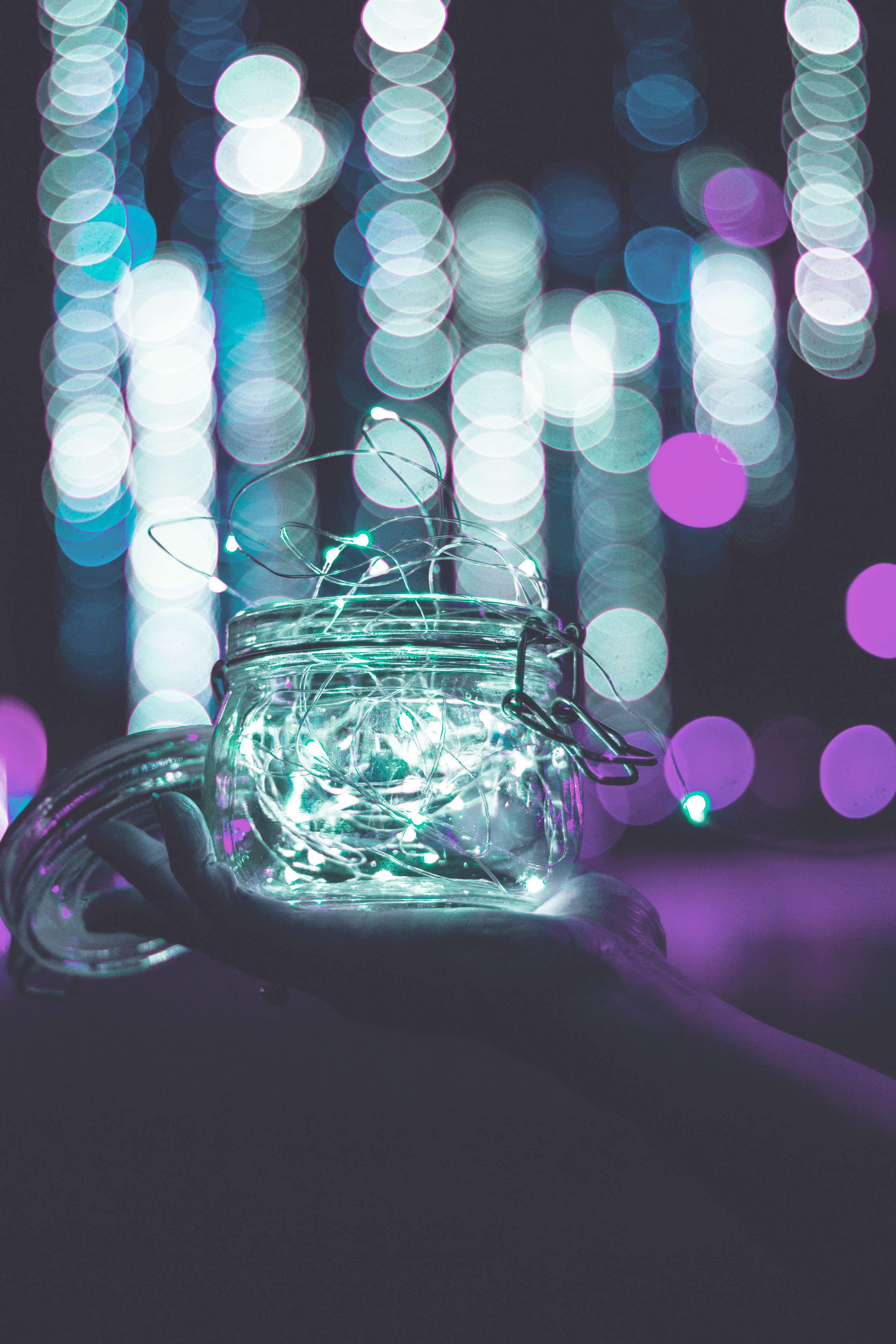 clear glass jar with string lights